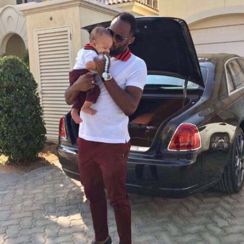 Jires Kembo Ekoko with his child