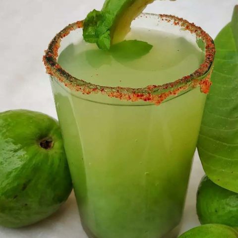 Refreshing green guava juice in a glass