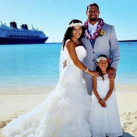 Joelle Anoa'i with her parents during their wedding