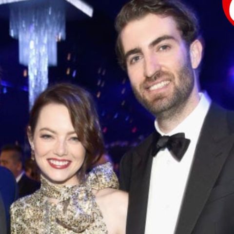 Louise Jean McCary's parents, Emma Stone and Dave McCary posing for camera