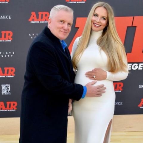 Actress Lucia Oskerova with husband, Anthony Michael Hall flaunting their baby bumb