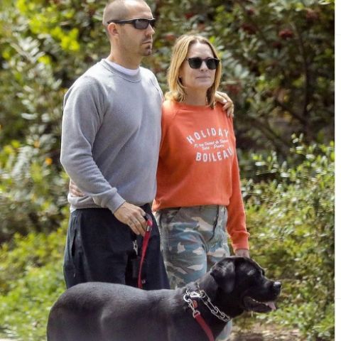 Clement Giraudet and Robin Wright with their pet