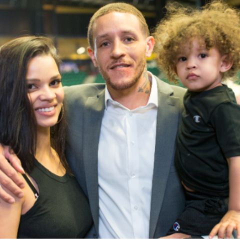 Caressa Suzzette Madden with her husband, Delonte West and their child
