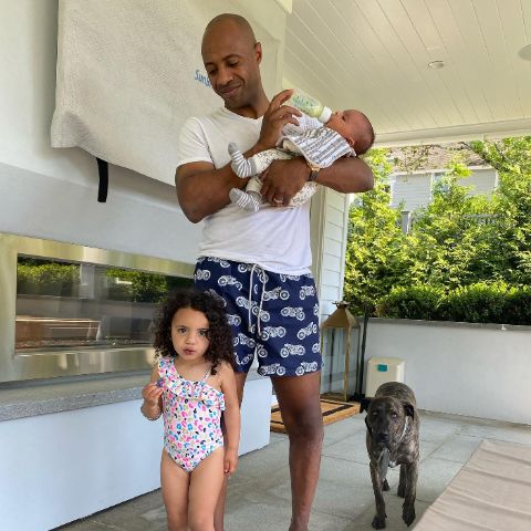 Nikki Bonacorsi' husband, Jay Williams with their children and a dog
