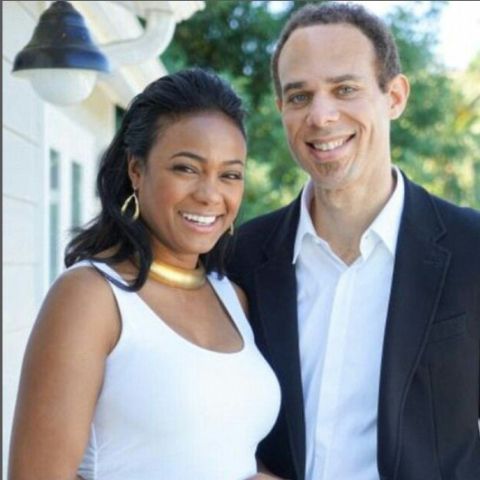 Vaughn Rasberry with his wife, Tatyana Ali
