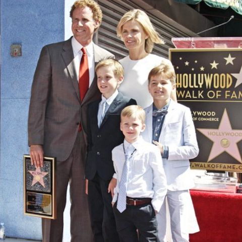 Viveca Paulin with her husband, Will Ferrell, and their children during an event
