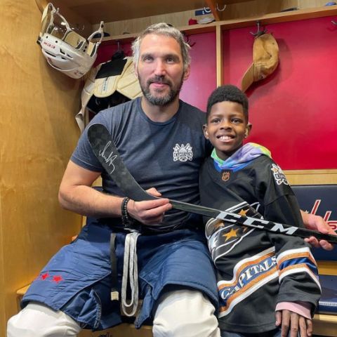 Keivonn Woodard with his hockey coach
